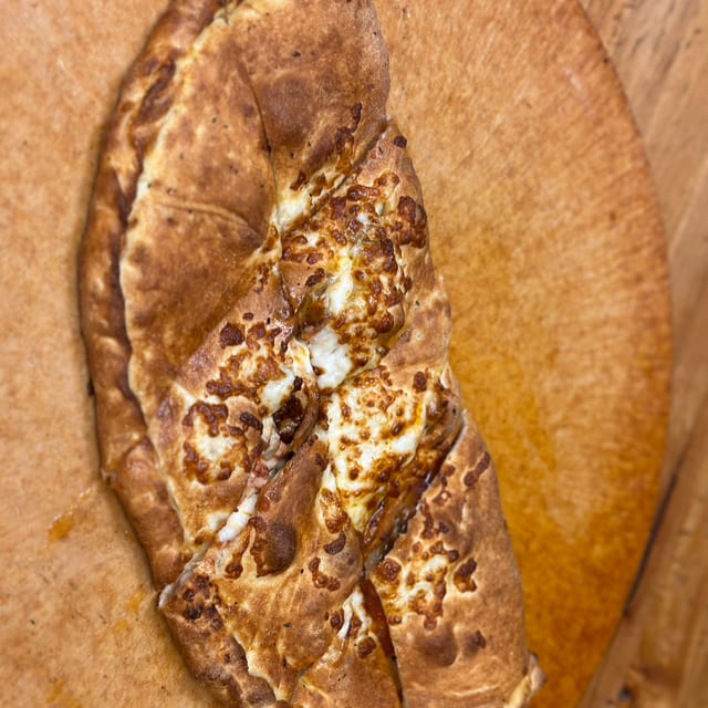 Calzone w/ 1 Topping.