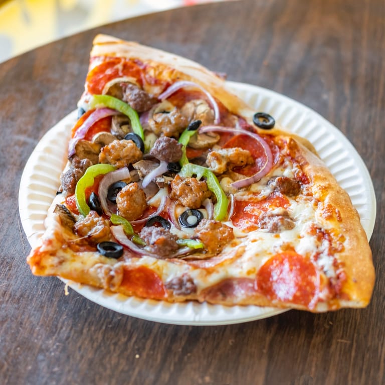 Indulge in Our Supreme Pizza